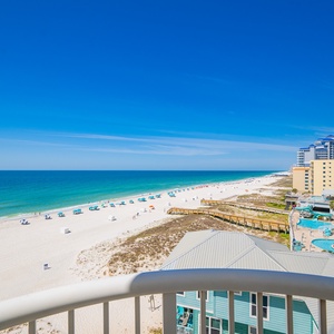 Enjoy relaxing beachfront views from this inviting balcony, perfect for relaxation and soaking in the serene atmosphere