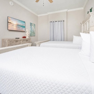 Relax on one of the queens and enjoy a good movie while unwinding after a day of beachside fun