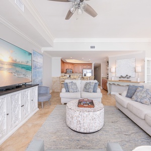 Living space featuring a large TV, stylish decor, and a cozy atmosphere perfect for relaxation