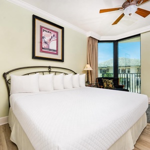 Retreat to the king master suite with cozy bedding and drift off to coastal sights and sounds of the bay