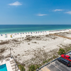 Enjoy stunning beachfront views from this inviting space, perfect for relaxation and unwinding by the water