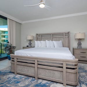 Retreat to the king master suite with cozy bedding and drift off to coastal sights and sounds of the bay