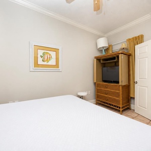 Relax on the cozy queen bed in this guest suite and stream your favorite shows after a fun vacation day