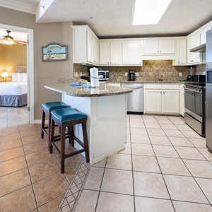 Enjoy cooking in the spacious kitchen featuring granite countertops, stainless appliances, and a convenient breakfast bar