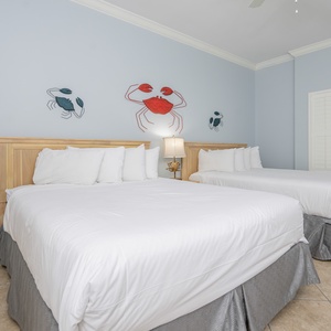 Relax on one of the cozy queen beds in this guest suite and enjoy a peaceful slumber