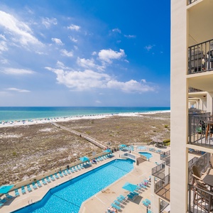 Savor the breathtaking beach views from your balcony as you relax and feel the gentle coastal vibe envelop you