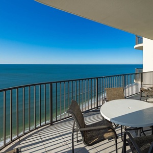 Sip morning coffee at your balcony table, taking in the serene coastal views and gentle sounds of the beach