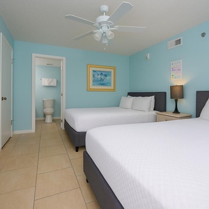 Nestle into the soft queen beds as you unwind after beach adventures, perfect for restful evenings with family