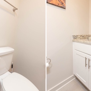 The half bath features a sleek granite countertop, modern fixtures, and a clean design for a refreshing experience