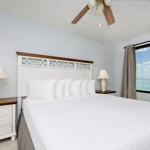 Awaken to the soothing coastal views from your master suite, inviting peaceful moments with every sunrise