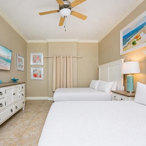 Unwind in this queen guest suite and stream your favorite shows or enjoy a good movie after a beach day