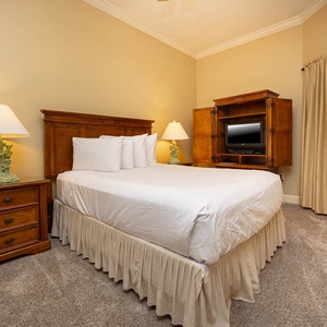 Relax on the cozy queen bed in this guest suite and enjoy a peaceful slumber