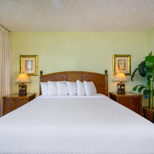 Relax on the plush king bed in the master suite and enjoy stunning balcony views