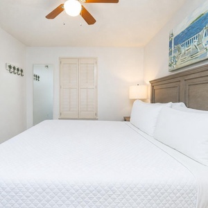 Enjoy peaceful moments in this guest bedroom, where the cozy king bed invites you to relax and unwind