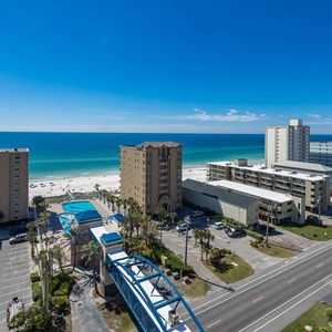 Enjoy stunning beach views from this bright living area with a large window, perfect for relaxation and entertainment