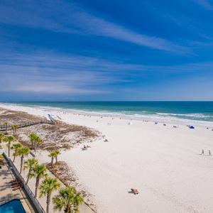 Tranquil, endless blue stretches across the coast as you savor peaceful moments from your balcony