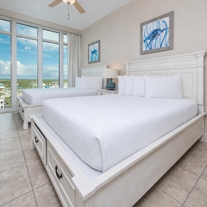 Drift into comfort in this queen guest suite, where serene views enhance your restful experience