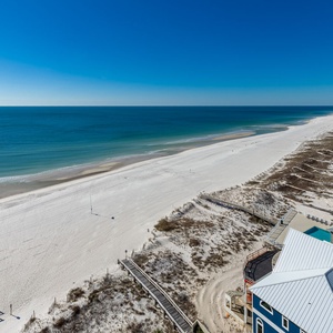 Experience seemingly endless coastline views of the horizon as waves lap the shore and the sun glistens over the water