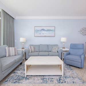 Settle into the sofa with a queen sleeper for a movie night, surrounded by coastal decor and warm, inviting light