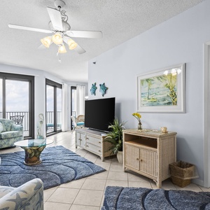 Relax in the inviting living area, where vibrant decor and sofa with queen sleeper create the perfect vibe for family