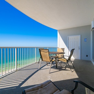 Your balcony lets you savor sparkling waves and gentle breezes while relaxing at the round table