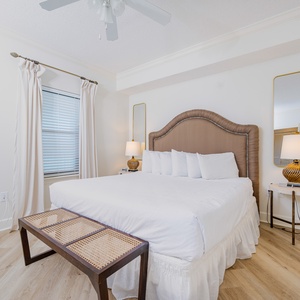 Drift into a tranquil sleep enveloped by soft bedding and the calming vibe in this king guest suite