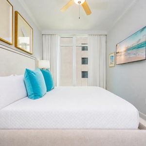 Relax on the cozy king bed in this guest suite and stream your favorite shows after a beach day