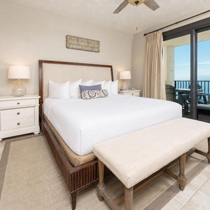 Drift into peaceful dreams in the master suite, where plush bedding invites restful nights with coastal views