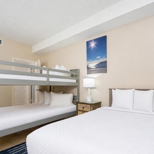 Enjoy family fun in this guest room, complete with full bunk beds and a double bed for restful nights