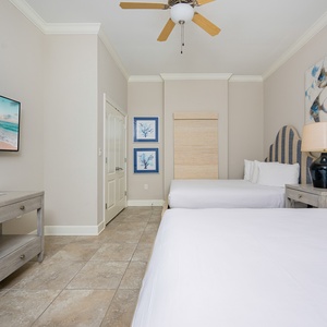 Unwind in this queen guest suite and stream your favorite shows or enjoy a good movie after a beach day