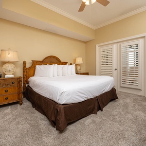 Sink into the soft king bedding, enjoying a peaceful night's rest in this inviting master suite with a serene vibe