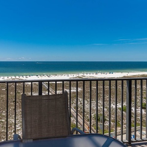 Balcony view showcases the gulf and white sand beach, perfect for relaxing while enjoying the coastal breeze