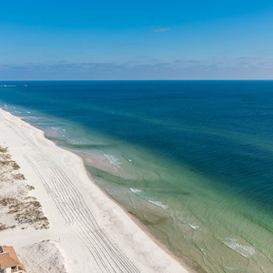 Enjoy breathtaking views of the coastline and clear waters from your inviting beachfront balcony