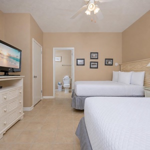 Two double beds in the guest suite invite you to settle in and stream a movie after your day outdoors