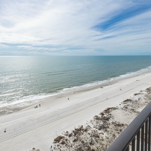 Breathe in the fresh air as you take in the panoramic views of the coastline and gentle waves from your balcony