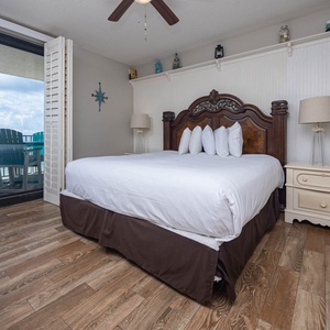 Unwind in a spacious master suite featuring a king bed and direct access to your beachfront balcony