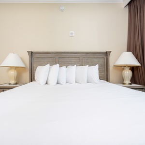 Experience restful nights in this queen guest suite, enjoying serene views from the balcony