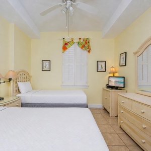 Twin beds in the guest suite invite you to relax after a day filled with coastal adventures