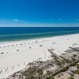 Experience seemingly endless coastline views of the horizon as waves lap the shore and the sun glistens over the water