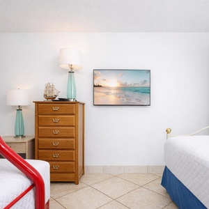 Enjoy quality time in this guest room with a twin bed and a twin over full bunk