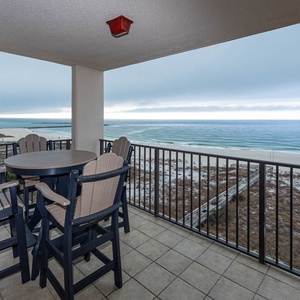 Savor meals on the balcony while enjoying tranquil views of the coastline and gentle waves