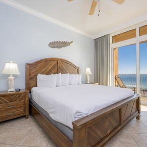 Awaken to serene beachfront views as you enjoy a restful night in the king master suite with balcony access