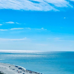 Picture the sunlight dancing on the gulf as the shoreline and gentle waves unfold beneath you