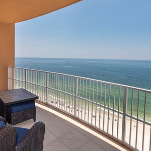 Lounge on cozy seating on the beachfront balcony while listening to gulf waves and watching the shoreline