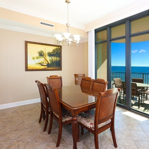Gather around the elegant dining table, sharing stories as you admire the captivating views of the coast