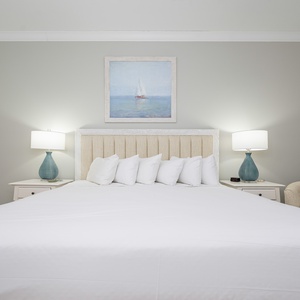 Surround yourself with fluffy pillow in this king guest suite and unwind after discovering the day's beach adventures