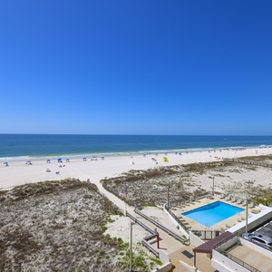 Enjoy breathtaking beachfront views from this inviting space, perfect for relaxation and fun under the sun