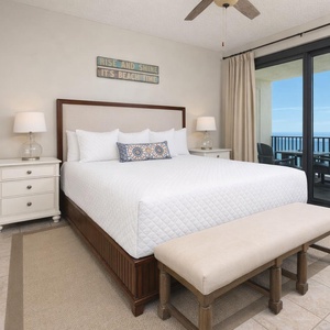 Drift into peaceful dreams in the master suite, where plush bedding invites restful nights with coastal views