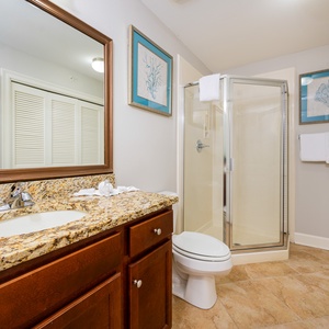 Refresh in this additional bath with a walk-in shower and laundry area with a washer and dryer in your rental