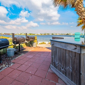 Grill up a feast or today's biggest catch by the water while soaking in the serene views with the family at The Pass